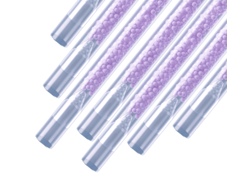 Seven Unistraw transparent straws with purple bubbles in them.