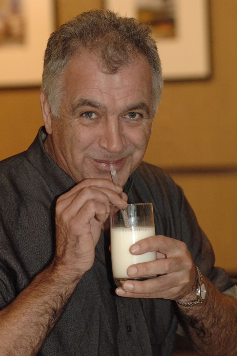 Portrait of a man using Unistraw